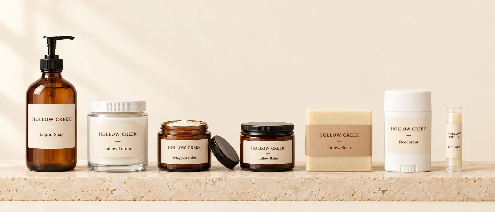 The full TallowPal range standing in a row, every product with the same sample brand label